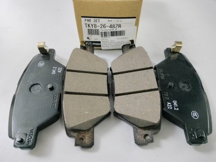 Колодки дискового тормоза MAZDA TKY82648ZB